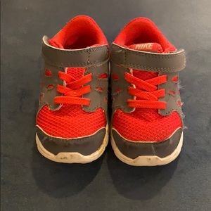 Red toddler Nikes.
